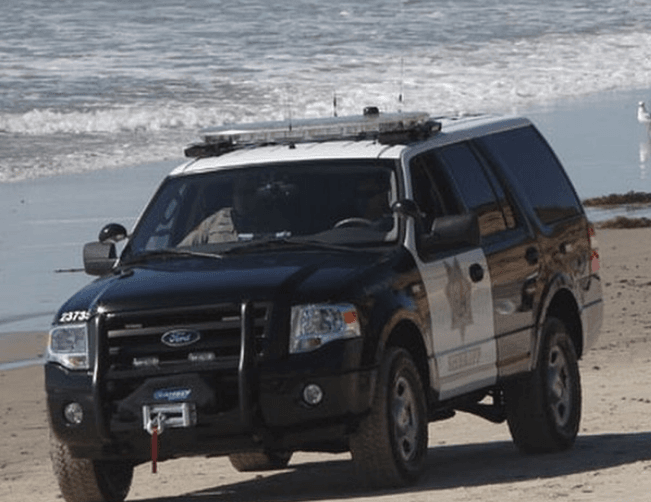 patrol car on beach