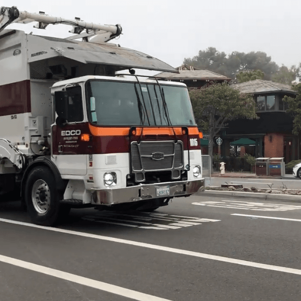 Trash truck in downtown del mar 