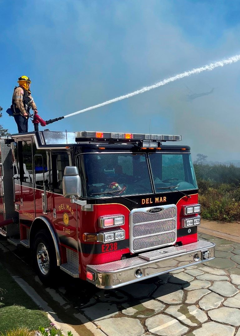 Firefighter shoots water cannon